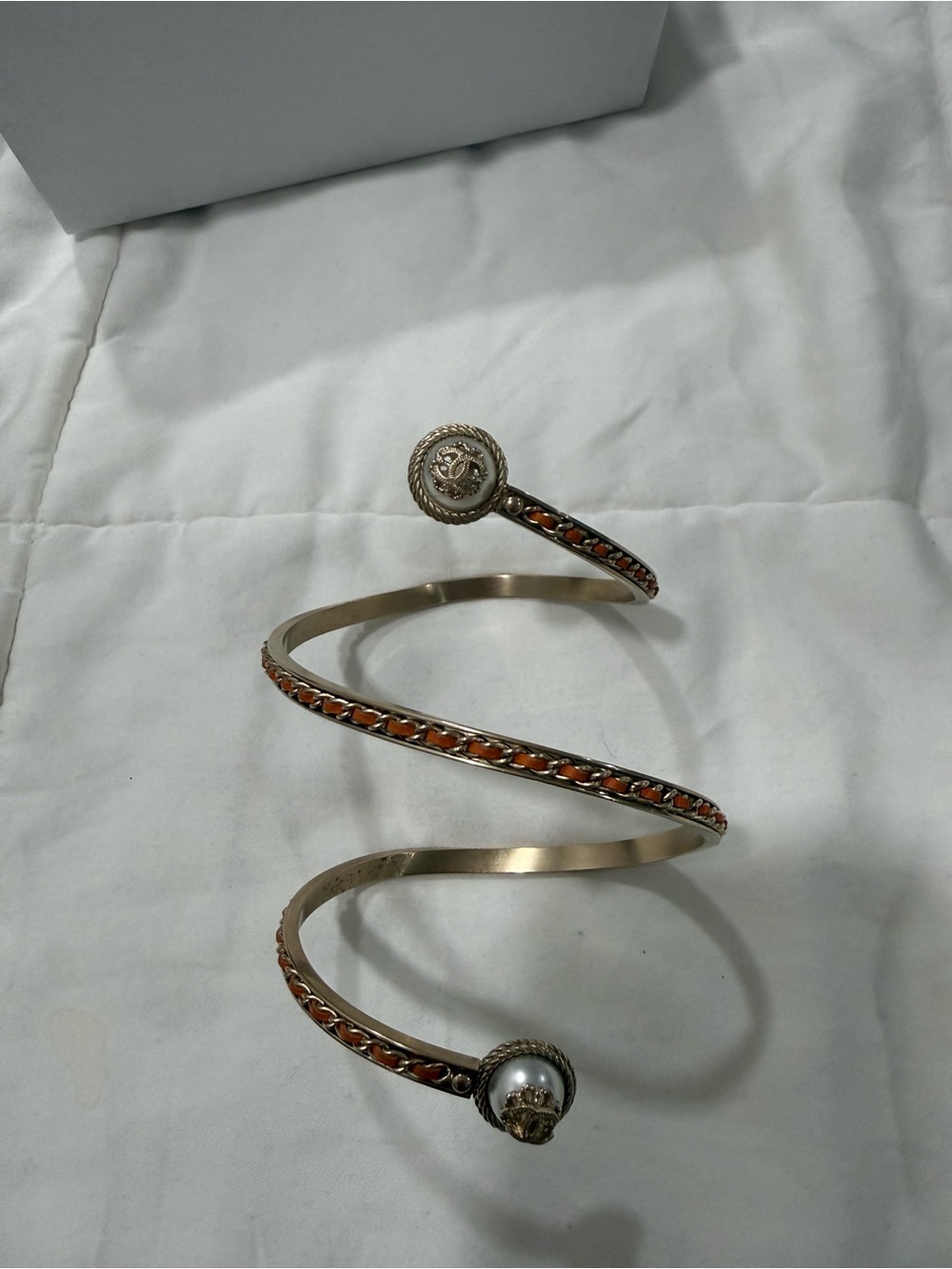 Chanel Spiral Bangle Bracelet with Orange leather through out and Pearl Accent